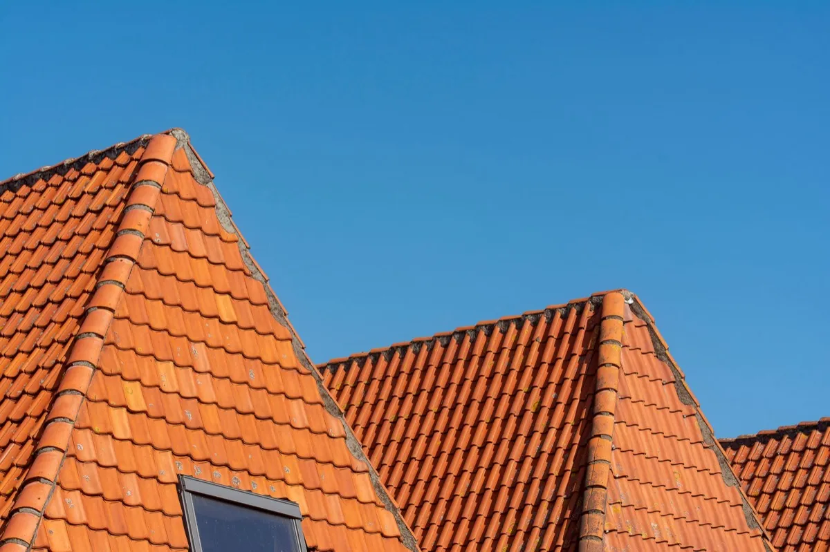 Clay barrel tile rooflines on homes in Raleigh, NC