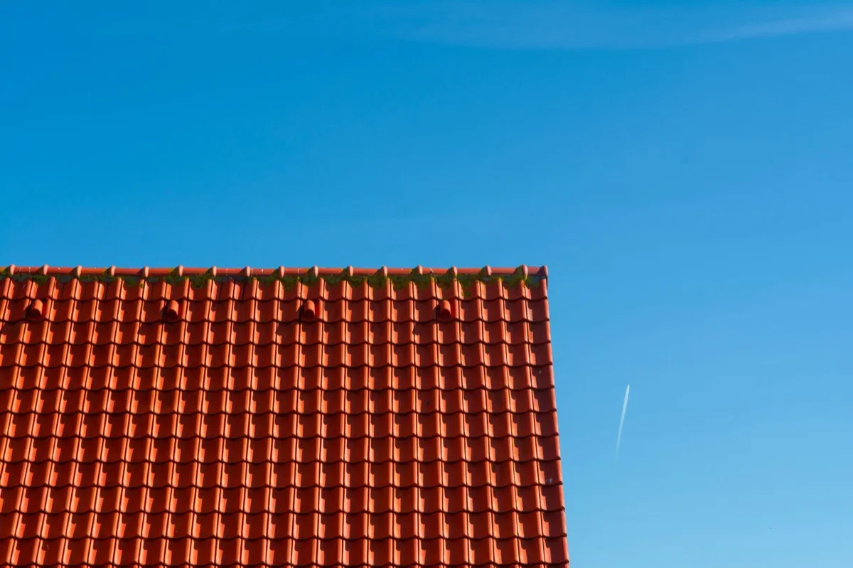 Tile roof gable in full sun, the kind of exposure that sets roof life in Raleigh, NC